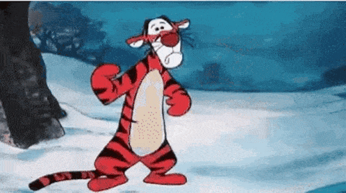 a cartoon tiger is standing in the snow .