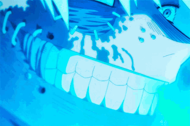 a close up of a person 's mouth with a blue background and a few letters