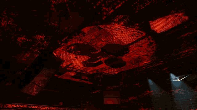 a skull is projected on the ceiling of the room