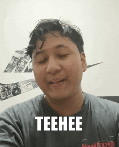 a man wearing a grey shirt that says novel concepts on it