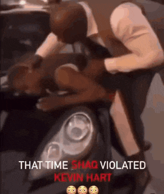 a man is sitting on the hood of a car with the words that time shaq violated kevin hart on the bottom