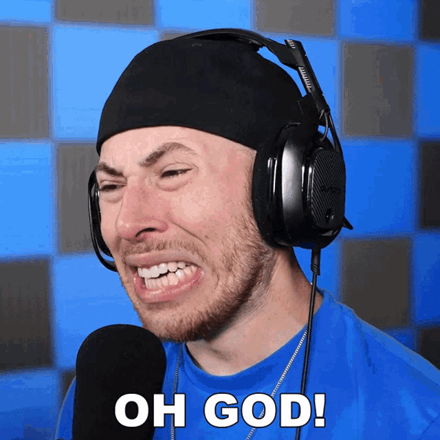 a man wearing headphones and a blue shirt is making a funny face with the words oh god below him