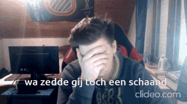 a man is covering his face with his hand and the words wa zedde gij toch een schaand are below him