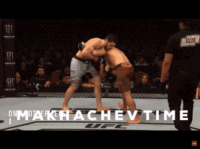 two men are fighting in a ufc ring and the words makhatchev time are visible