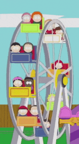 a group of people are riding a ferris wheel at an amusement park