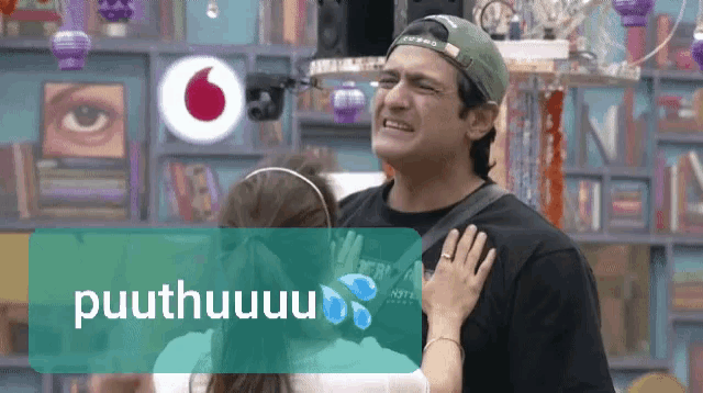 a man and a girl are hugging with the word puuthuhuu on the bottom