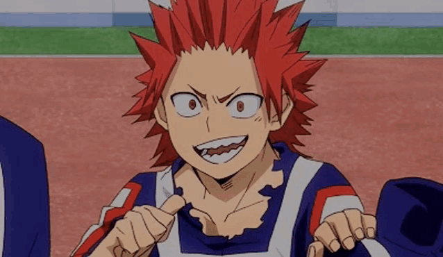 a close up of a cartoon character with red hair and sharp teeth .