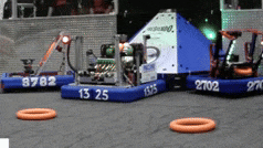 a blurred image of a robot with the number 13 25 on it