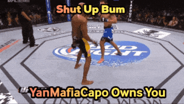 a picture of a boxing match with the words shut up bum yanmafia capo owns you