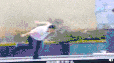 a blurred image of a person standing on a bridge
