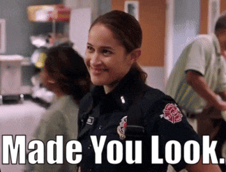 a woman in a police uniform is smiling with the words made you look below her