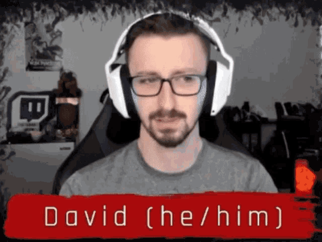 a man wearing headphones and glasses is named david ( he / him )