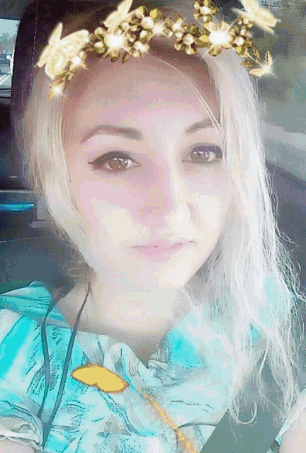 a woman wearing a floral crown on her head