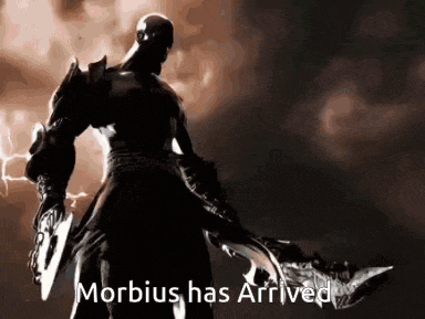 a silhouette of a man holding a sword with the words `` morbidus has arrived '' written below him .