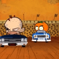 a bald man is standing next to a blue car and an orange car