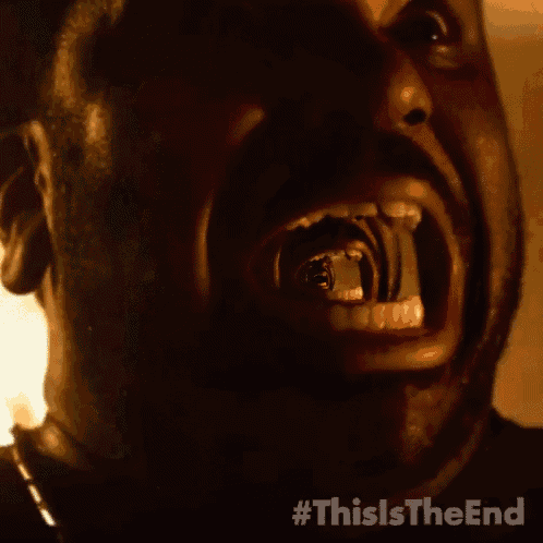 a close up of a man 's mouth with #thisistheend written on the bottom right