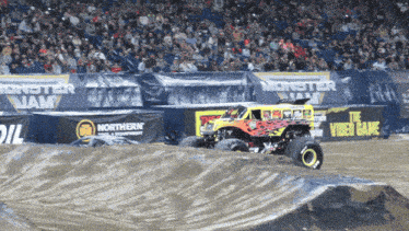 a monster jam event is taking place in front of a northern oil sign