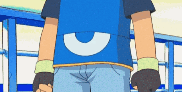 a cartoon character wearing a blue shirt with a white circle on it