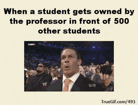 a man in a suit and tie stands in front of a crowd with the words when a student gets owned by the professor