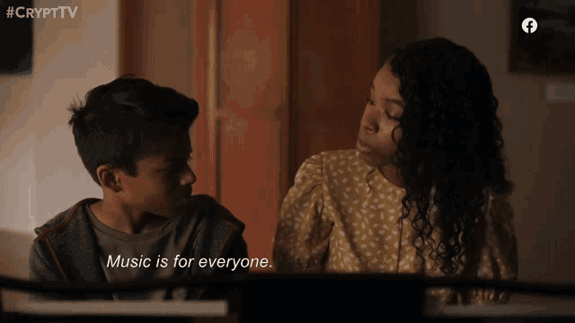 a woman and a boy are sitting next to each other with the caption music is for everyone