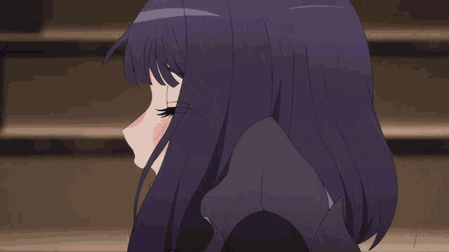 a girl with purple hair is licking her lips