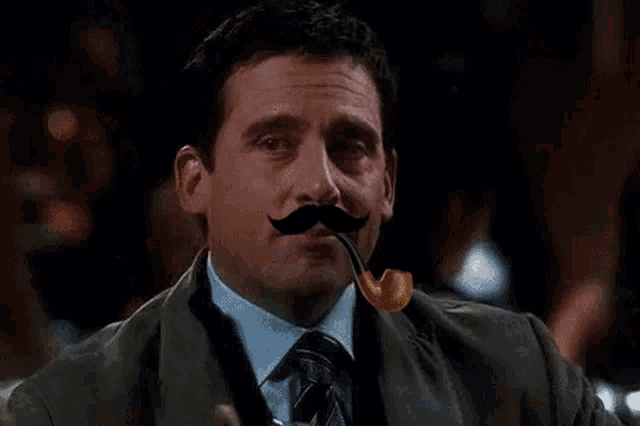 a man in a suit and tie is holding a glass of whiskey and a pipe in his mouth .