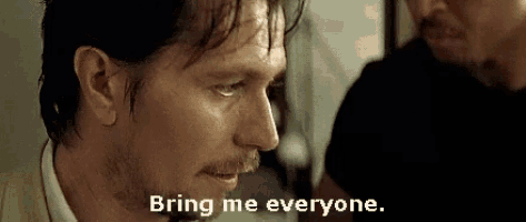a man with a beard and mustache is talking to another man and says `` bring me everyone '' .