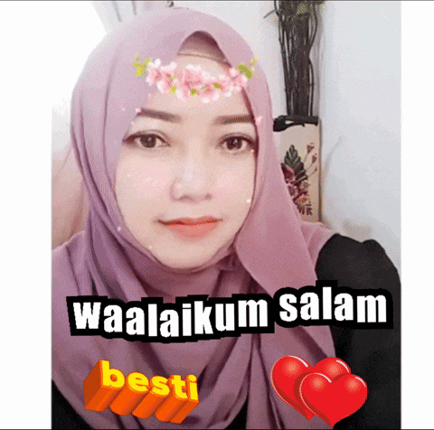 a woman wearing a purple hijab says waalaikum salam