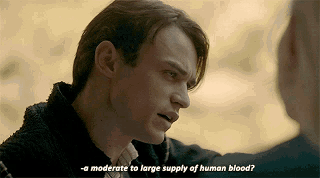 a man talking to another man with the words " a moderate to large supply of human blood " written below him