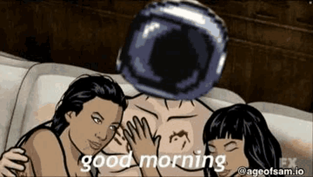 a man is laying on a couch with two women and a ball on his chest .
