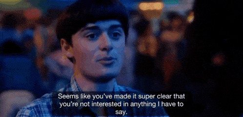 a woman is talking to a man in a dark room and says `` that 's just not true '' .