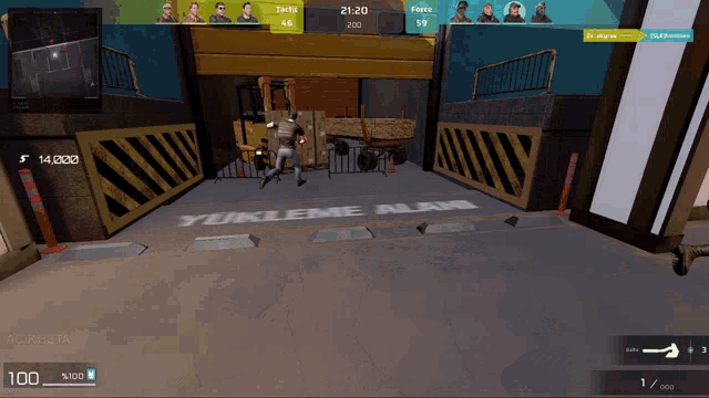 a screenshot of a video game shows a forklift and a sign that says yukleme alani