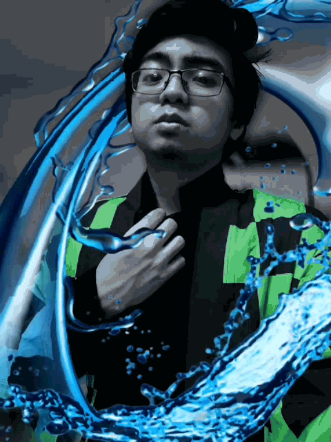 a man with glasses and a green jacket is surrounded by blue water splashes