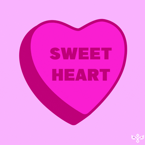 a pink heart shaped candy says sweet heart