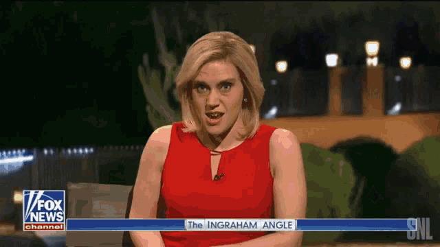 a woman in a red dress is reporting on the ingraham angle on fox news channel