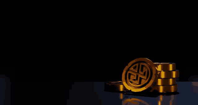 gold coins stacked on top of each other with the letter r on them