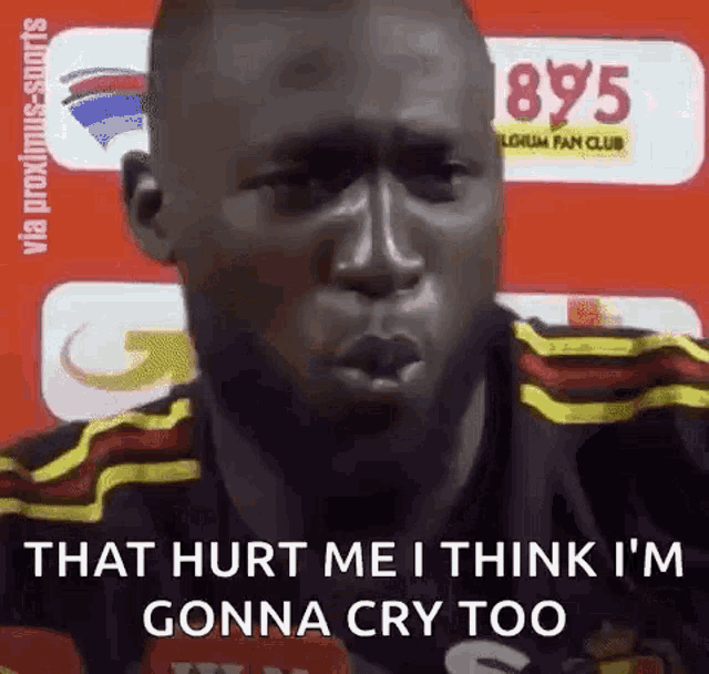 a man is making a funny face and saying `` that hurt me i think i 'm gonna cry too ''