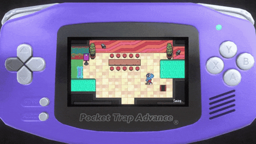 a purple pocket trap advance game console with a game on it