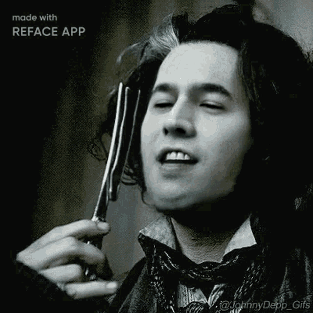 a man is holding a pair of scissors in his hand with the words made with reface app below him