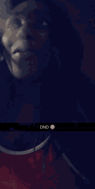 a snapchat of a person with the word dnd on the bottom right