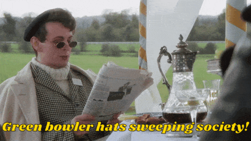 a man reading a newspaper with the words green bowler hats sweeping society behind him