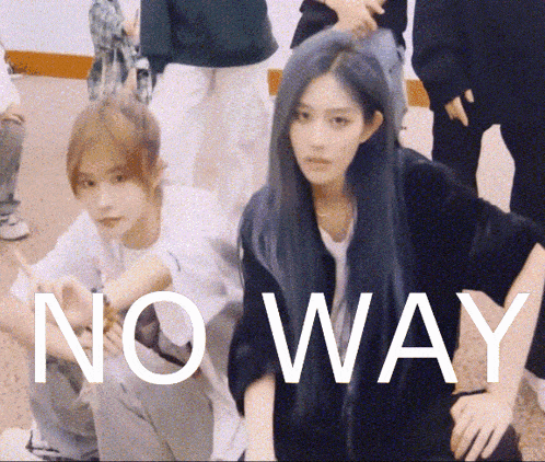 two girls are sitting next to each other with the words no way written in white