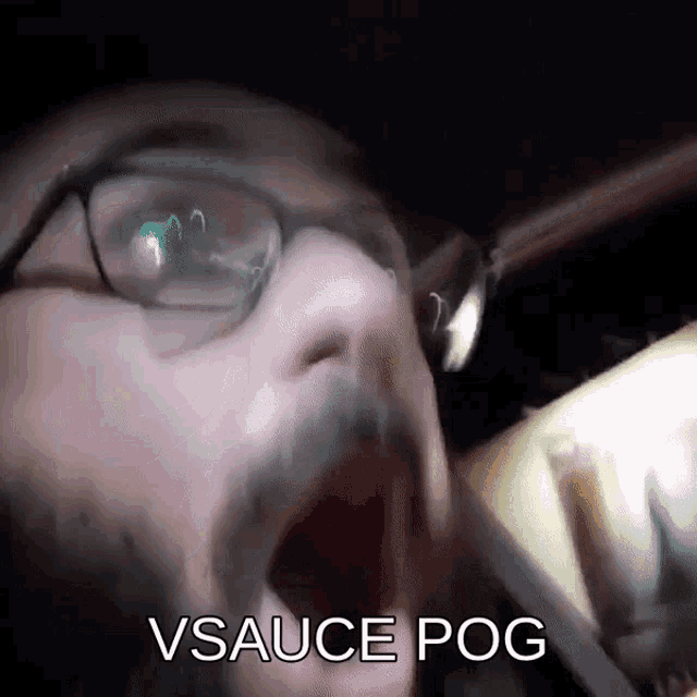 a man with glasses and a beard has his mouth wide open and the words vsauce pog written below him
