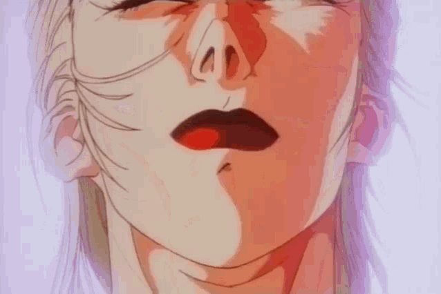 a close up of a woman 's face with a red lip