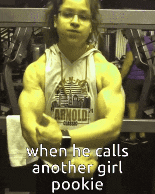 a man in a tank top with arnold classic on it