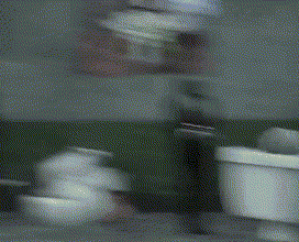 a blurry picture of a person in a bathroom