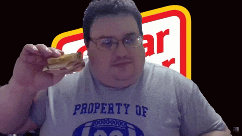 a man is wearing a shirt that says property of