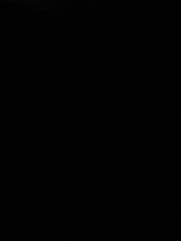 a black background with a few white dots on it .