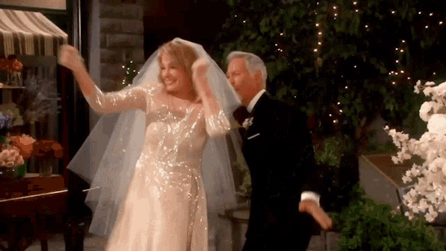 a bride and groom are dancing at their wedding reception