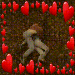 a couple of people standing in a field with hearts around them